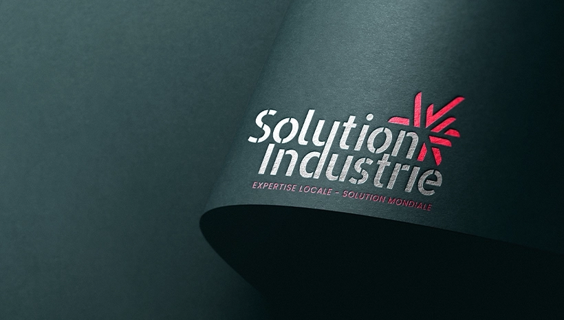 Embossage du logo Solution Industrie par notre Agence branding industrie